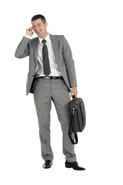 Businessman with mobile phone and case clipart