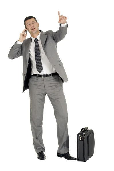 Empresario con teléfono móvil y estuche — Foto de Stock