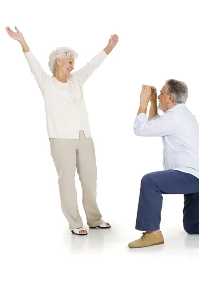 Elderly couple taking pictures — Stock Photo, Image