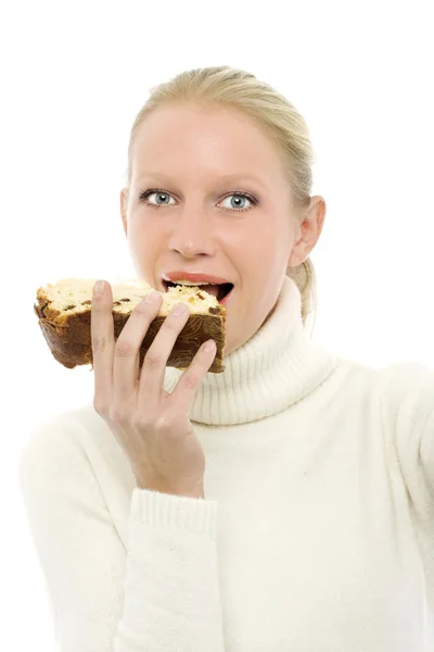 Portrait of a young caucasian woman wearing a white turtleneck sweater and — Stock Photo, Image