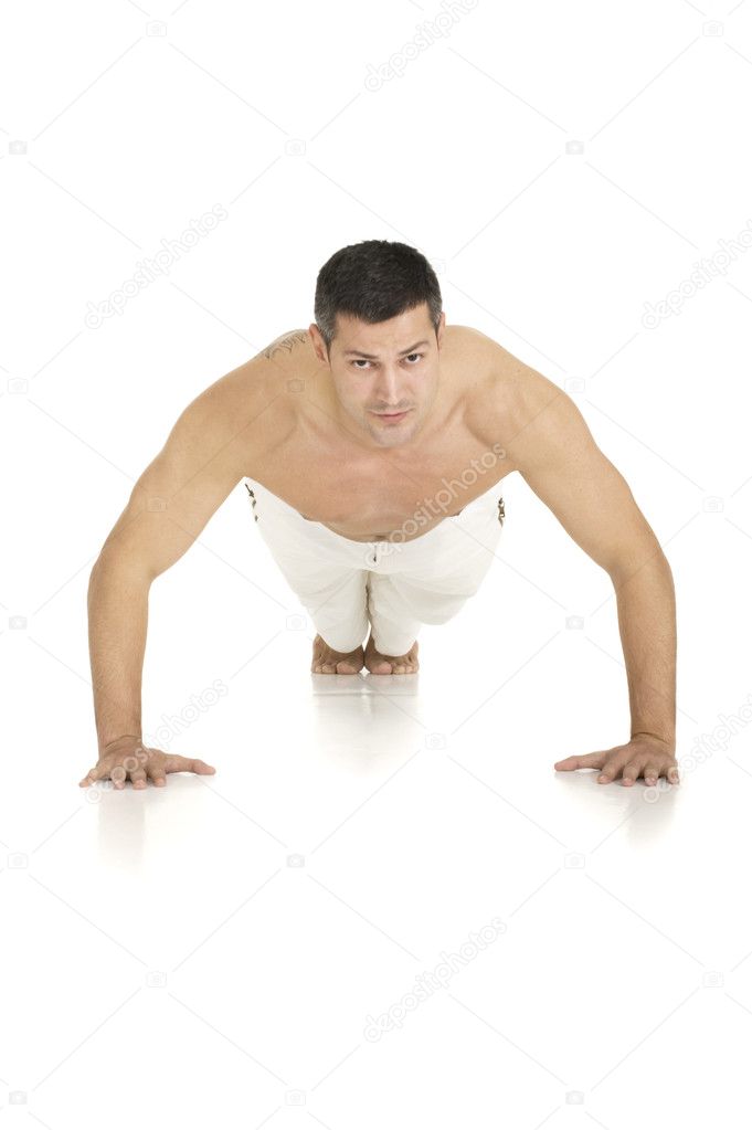 Bare-chested man does push-ups
