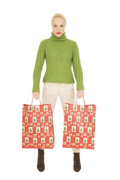 Frau mit Taschen mit Weihnachtsgeschenken — Stockfoto