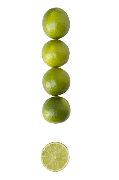 Limas de limão e metade na linha isolada sobre fundo branco — Fotografia de Stock