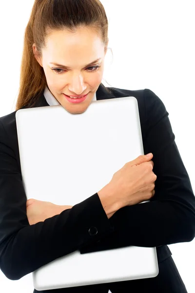 年轻的女商人用在武器上白色背景工作室的笔记本电脑 — 图库照片