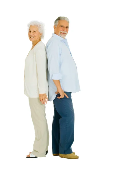 Äldre par rygg mot rygg — Stockfoto