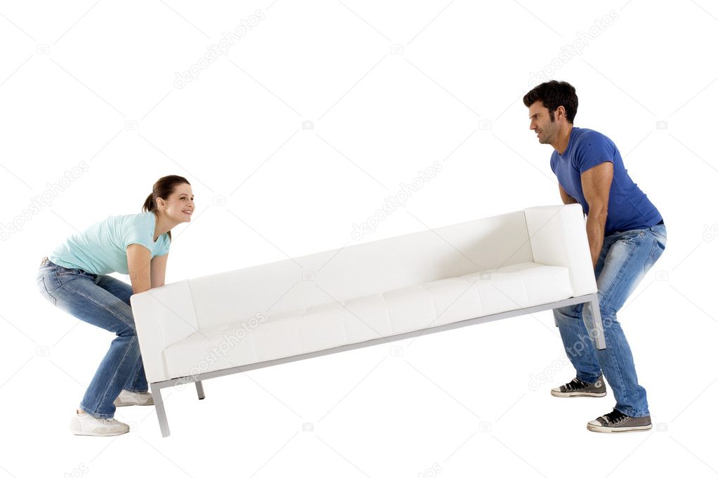 Couple carrying a sofa
