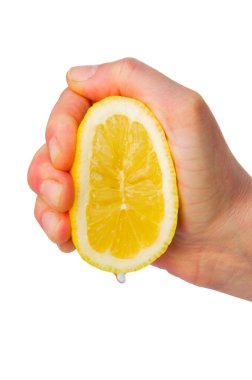 Hand squeezing a lemon clipart