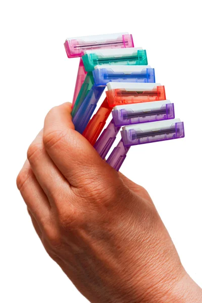 Hand holding disposable razors — Stock Photo, Image