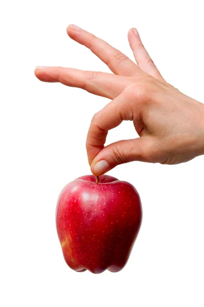 Рука, держащая красное яблоко — стоковое фото