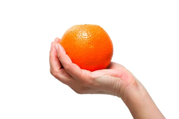Mão segurando uma laranja — Fotografia de Stock
