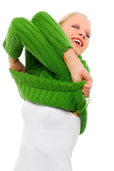 Portret van een jonge blanke vrouw met groene coltrui — Stockfoto