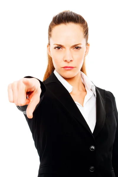 Severe businesswoman with her hand indicating — Stock Photo, Image
