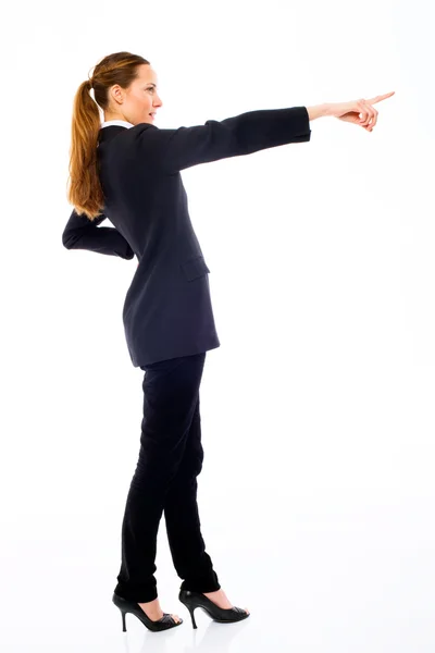 stock image Young businesswoman standing with her hand indicating