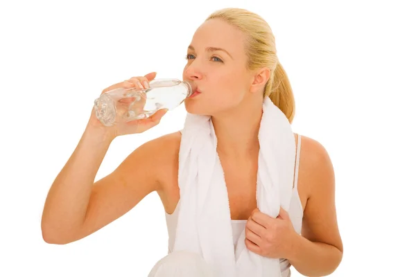 Woman with towel on her back drinking — Stock Photo, Image