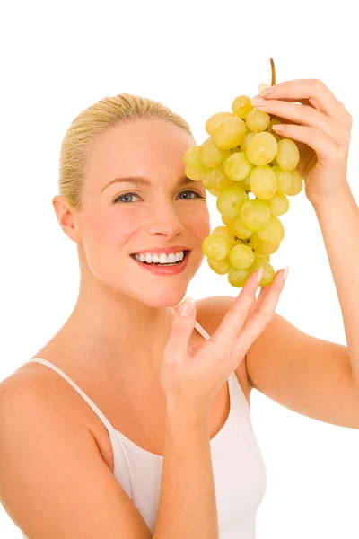 Женщина с белым виноградом — стоковое фото
