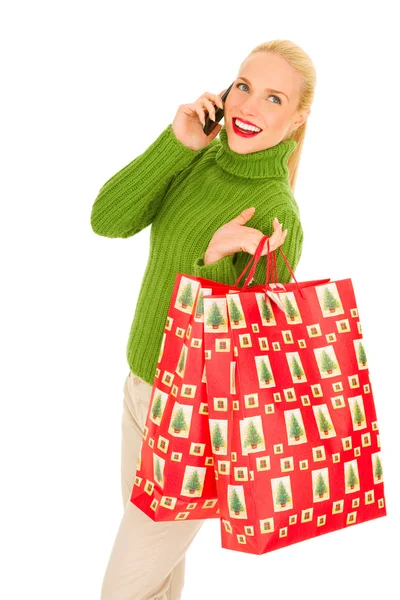 Woman with mobile and bags — Stock Photo, Image