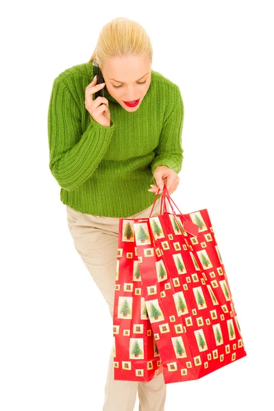 Woman with mobile and bags — Stock Photo, Image