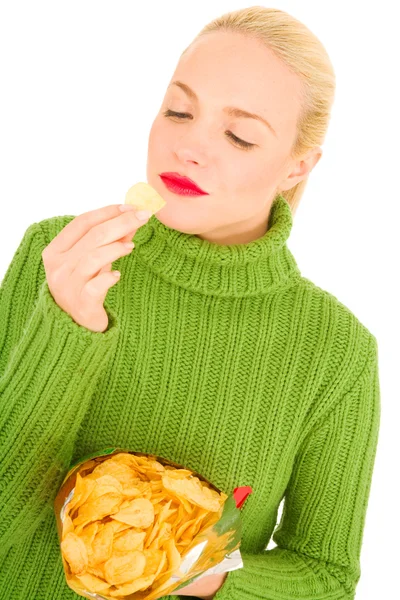 Woman eating crisps — Stock Photo, Image