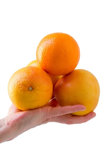 Oranges in one hand — Stock Photo, Image