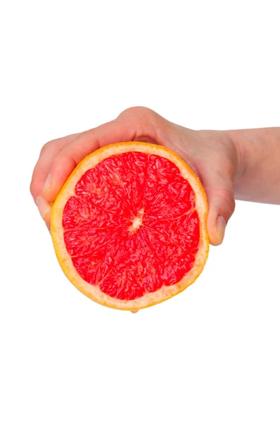 Apertando a mão de uma laranja — Fotografia de Stock