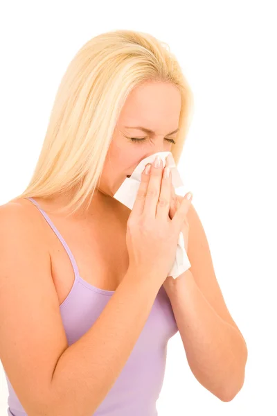 Woman who is blowing the nose Stock Image