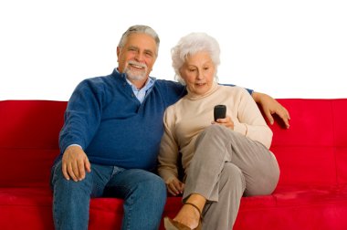 Elderly couple on the sofa clipart