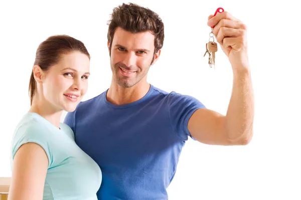 Casal com as chaves da nova casa — Fotografia de Stock