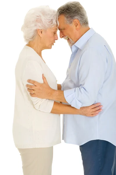Elderly couple facing each other — Stock Photo, Image