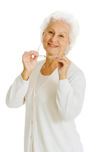 Пожилая женщина улыбается — стоковое фото