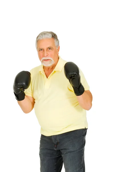 Älterer Mann mit Boxhandschuhen — Stockfoto