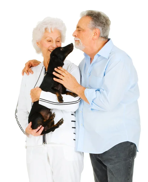 Couple âgé avec un teckel — Photo