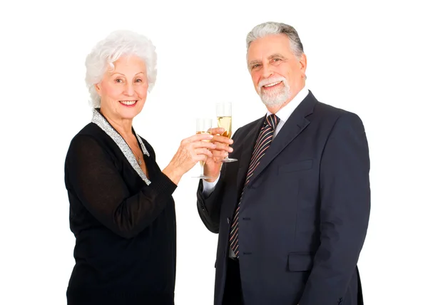 Elegáns idős házaspár pirítás — Stock Fotó