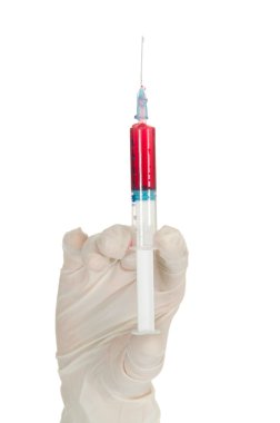 Hand holding a syringe clipart