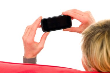 Woman holding a smartphone clipart