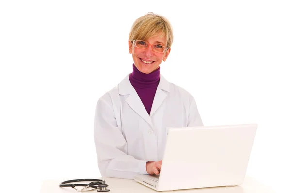 Female doctor at the desk — Stock Photo, Image