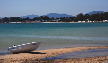 Lonely boat on the beach, Hammamet, Tunisia clipart