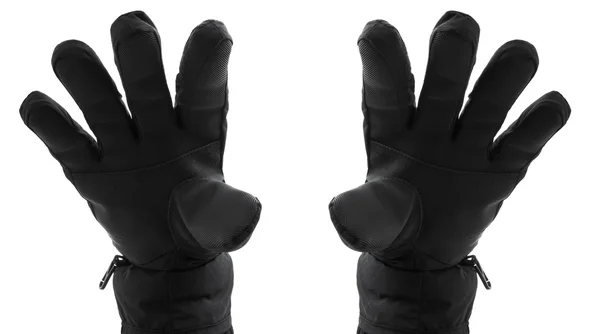 两个手在孤立在白色背景上的黑色手套 — 图库照片