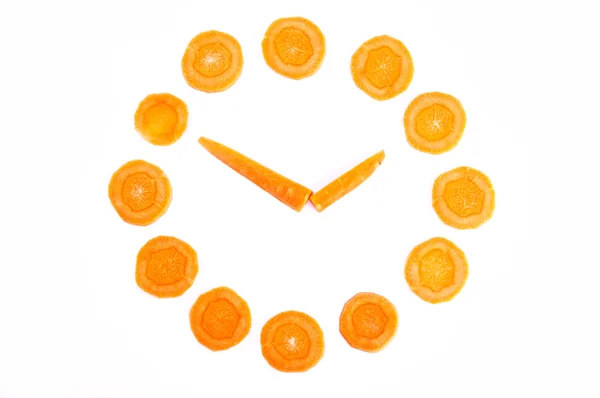 Orologio fatto di carote — Foto Stock