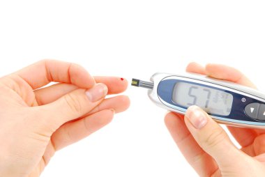 Diabetes person doing glucose level blood test using glucometer mmol/l and small drop of blood from finger. Mini monitor device clipart