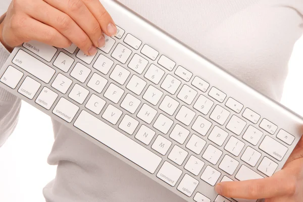 Mani Che Tengono Tastiera Del Computer Portatile Remoto Bianco Moderno — Foto Stock