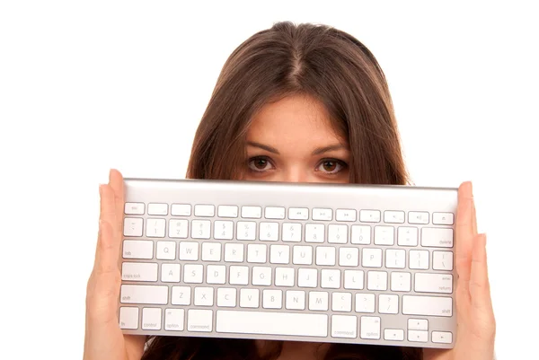 Mulher segurando teclado de computador branco — Fotografia de Stock