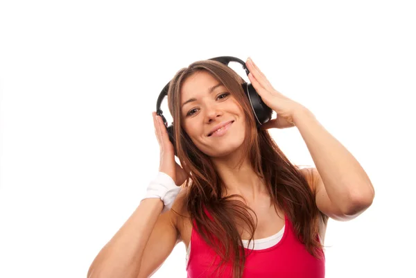 Atraktivní fitness bruneta žena naslouchání a užívat si — Stock fotografie