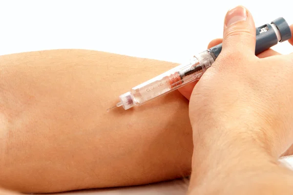 Hand medicinska insulin spruta penna injektor — Stockfoto