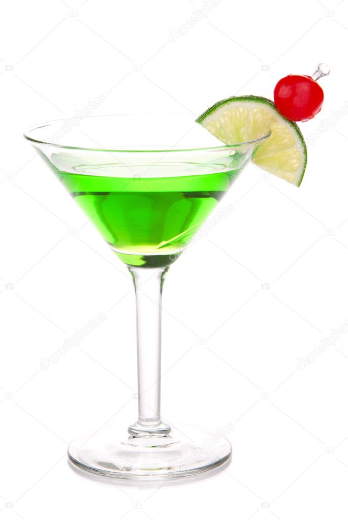 Green melon ball martini alcohol cocktail with vodka, light rum, gin, tequila, blue curacao, lemon juice, lemonade, lime slice, maraschino cherry isolated on a