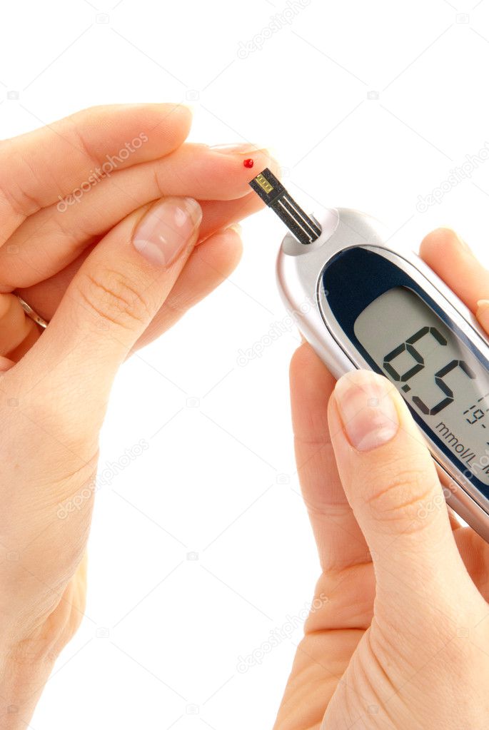 Dependent first type Diabetic patient measuring glucose level blood test using ultra mini glucometer and small drop of blood from finger and test strips isolate