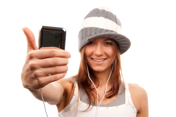 Woman with cellphone headphones thumb up — Stock Photo, Image