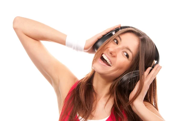 Ładny Fitness Brunetka Kobieta Słuchania Muzyki Słuchawkach Uśmiechając Się Śmiejąc — Zdjęcie stockowe