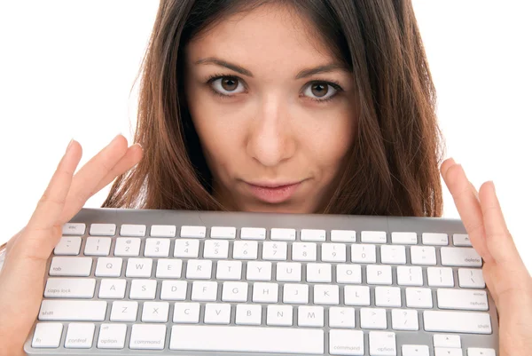 Mulher detém teclado para computador portátil sem fios — Fotografia de Stock