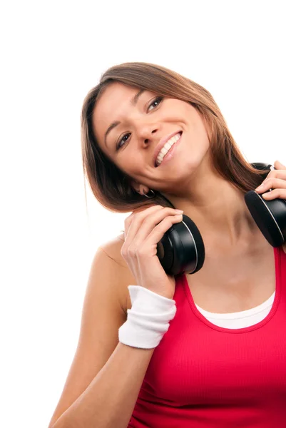 Brünette Frau hört und genießt Musik — Stockfoto