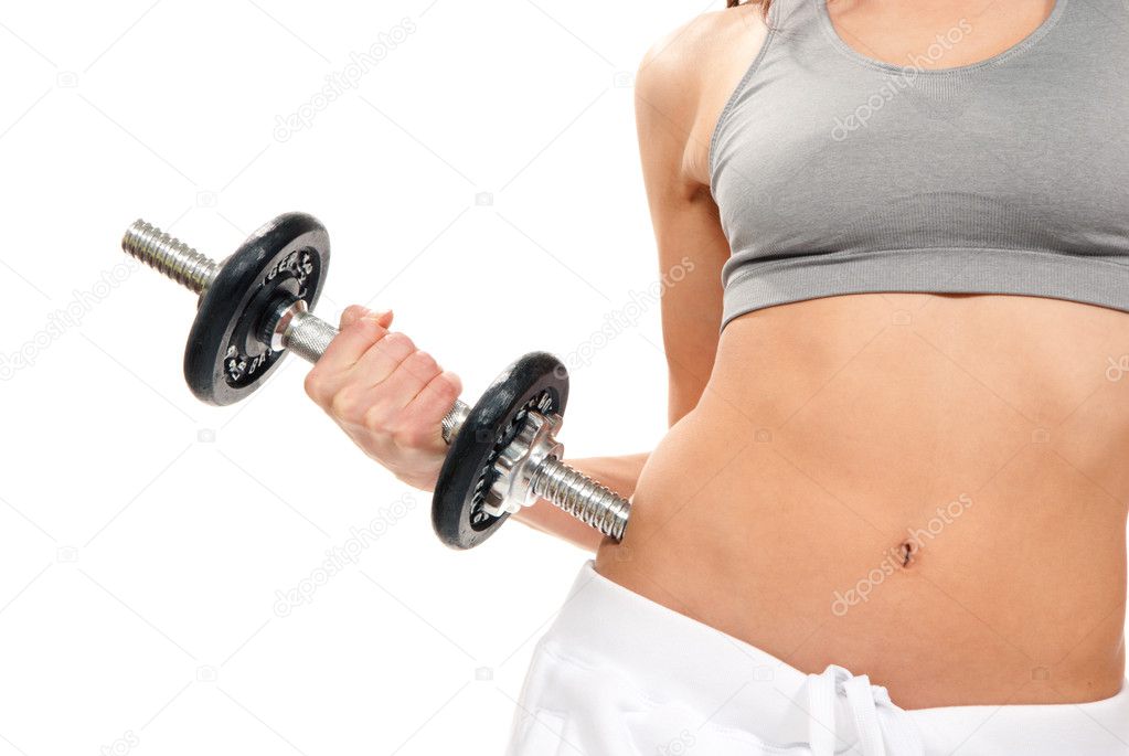Fitness woman working out dumbbells in gym